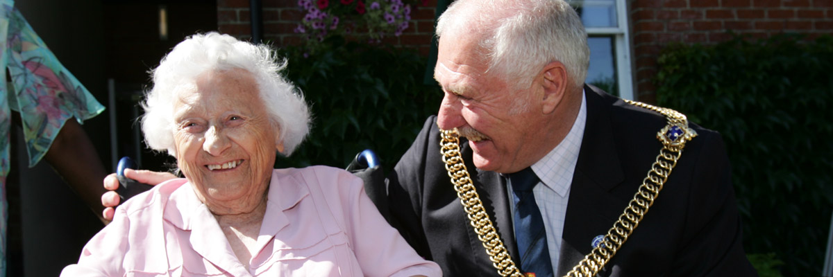 Lord Mayor laughs with resident