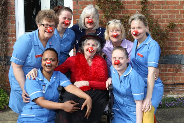 Our resident Gina Gosden is joined by the staff to show off their Red Noses.