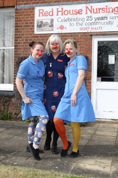 RGN Nurse Gill Wren is joined by Rebecca (L) and Anna to parade their outfits.